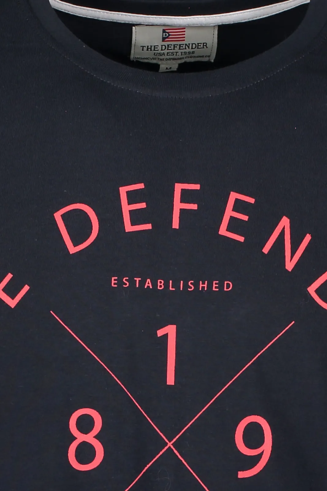 Shop THE DEFENDER Defender Earl Tee